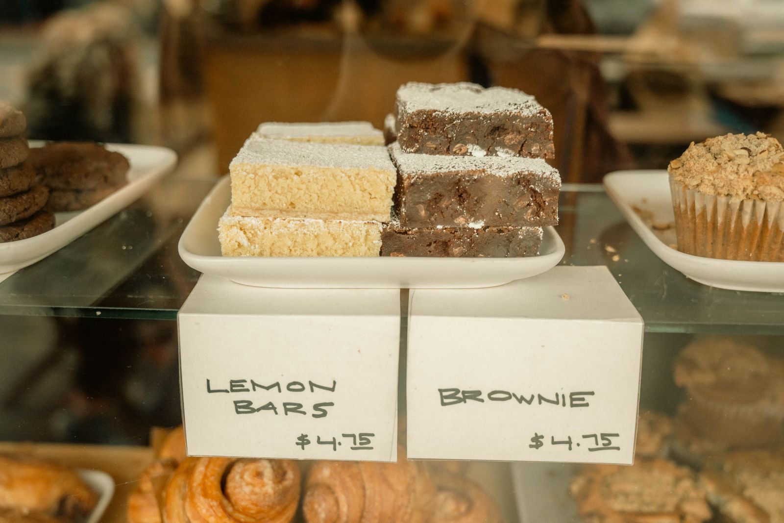 A bakery display case filled for the morning