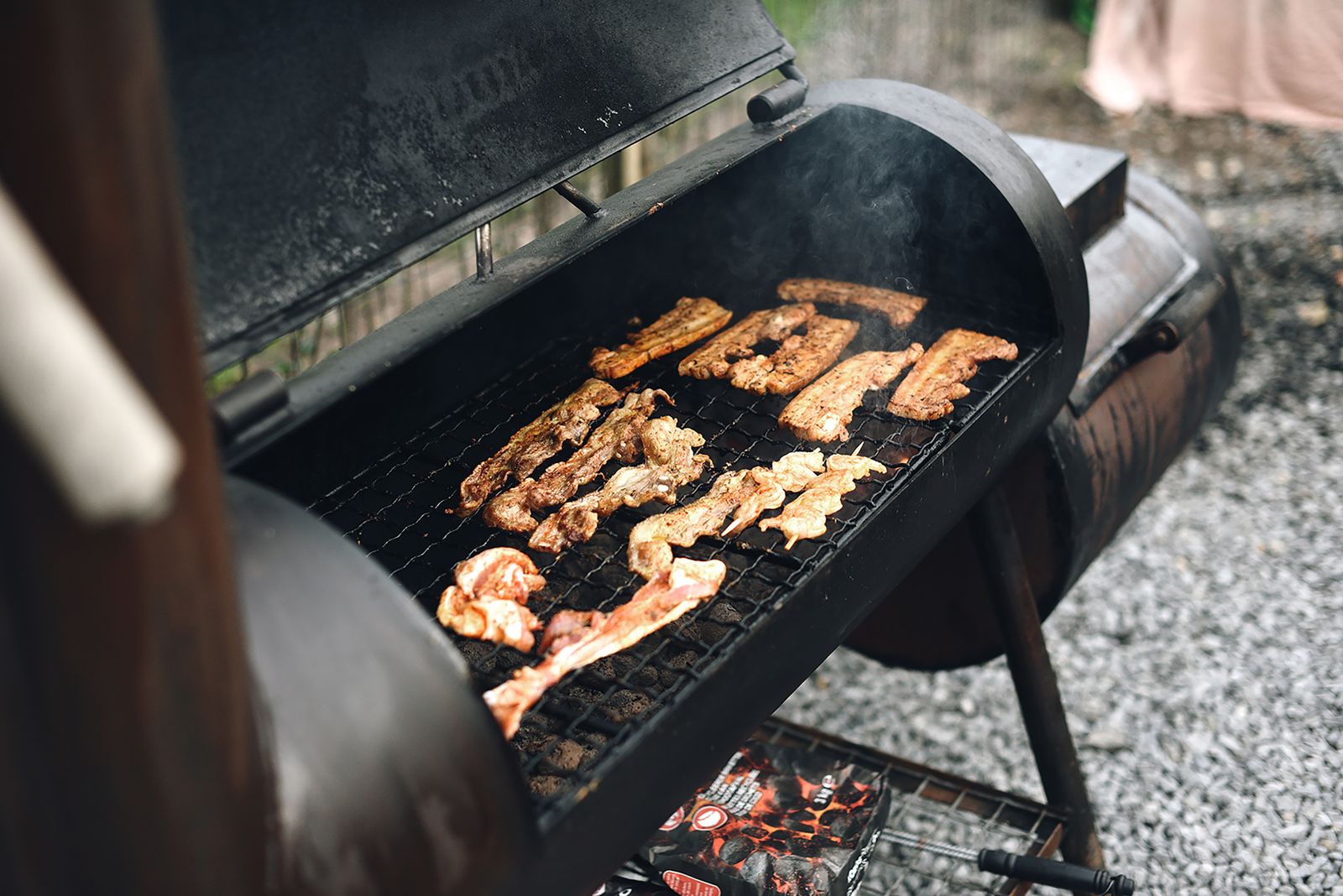 Smoked meat being carved at service
